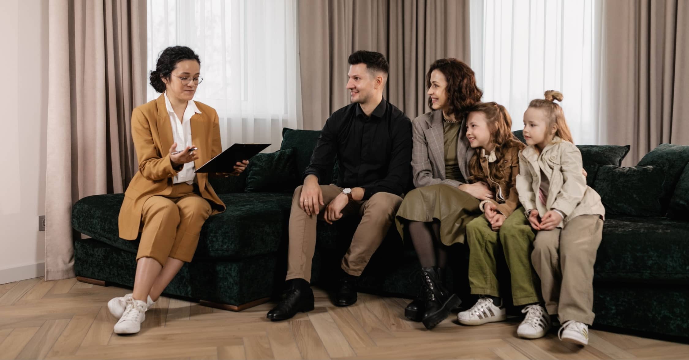 A financial advisor consulting a family about their 529 plan.